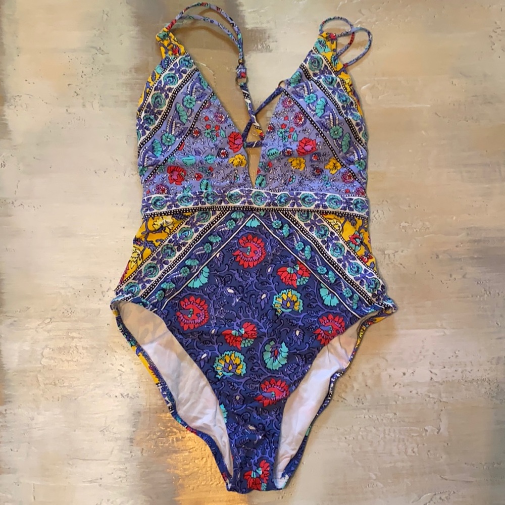 Colorful one-piece with crisscross back detail